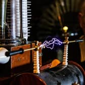 Owner of the Museum of Victorian Science, Anthony Swift watches the induction coil spark with electrity in his tiny attraction at the rear of his property in Glaisdale near Whitby, photographed for The Yorkshire Post  by Tony Johnson