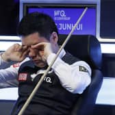 Ding Junhui rubs his eyes during his match against Mark Allen (not pictured) on day one of the MrQ UK Championship 2023 at York Barbican. Picture date: Saturday November 25, 2023. PA Photo. See PA story SNOOKER York. Photo credit should read: Richard Sellers/PA WireRESTRICTIONS: Use subject to restrictions. Editorial use only, no commercial use without prior consent from rights holder.