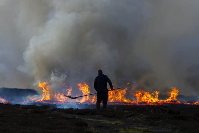 A controlled heather burn on the moors above Castleton in the North Yorkshire Moors National Park. Picture Tony Johnson