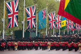 A military band march along The Mall in the Coronation Procession following the coronation ceremony of King Charles III at Westminster Abbey. Picture: Lucy North/PA Wire