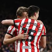 Key men: Anel Ahmedhodzic of Sheffield United celebrates with teammate Sander Berge after scoring the team's second goal against West Brom (Picture: George Wood/Getty Images)