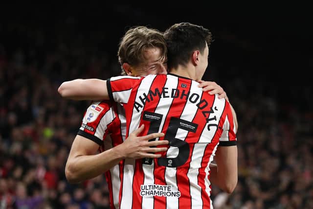 Key men: Anel Ahmedhodzic of Sheffield United celebrates with teammate Sander Berge after scoring the team's second goal against West Brom (Picture: George Wood/Getty Images)