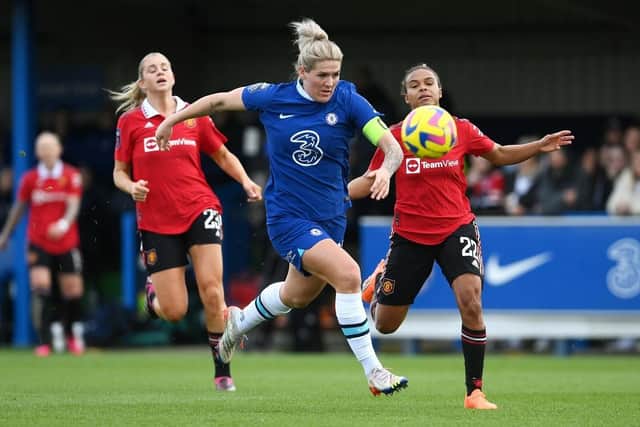 Millie Bright of Chelsea runs with the ball whilst under pressure from Nikita Parris of Manchester United during the FA Women's Super League match. (Pic credit: Mike Hewitt / Getty Images)