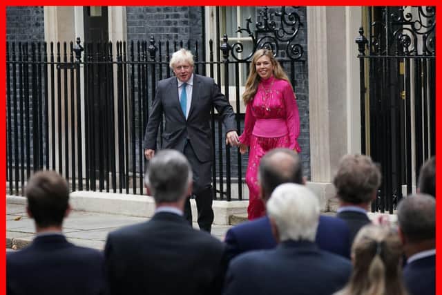 PABest

Outgoing Prime Minister Boris Johnson and Carrie Johnson are seen ahead of his speech outside 10 Downing Street, London, before leaving for Balmoral for an audience with Queen Elizabeth II to formally resign as Prime Minister. Picture date: Tuesday September 6, 2022. PA Photo. See PA story POLITICS Tories. Photo credit should read: Yui Mok/PA Wire