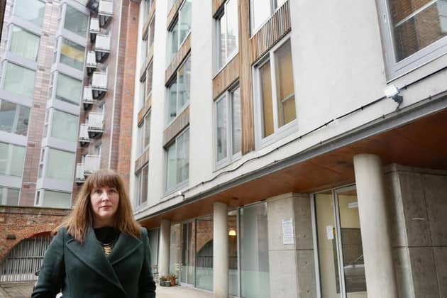 Rachael Loftus outside her apartment building in Leeds, which is caught up in the building safety scandal