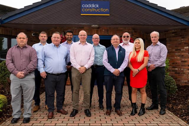 Combining strengths – members of the Caddick team with MD Paul Dodsworth (third from left) welcome their new colleagues.