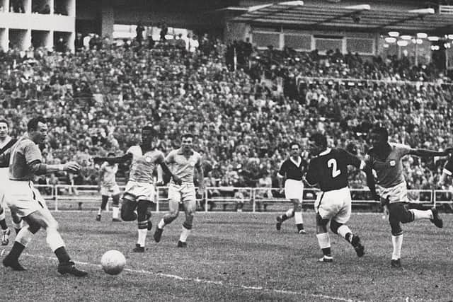 DEFINING MOMENT: Brazilian forward Pele scores past Welsh goalkeeper Jack Kelsey in the 1958 World Cup quarter-finals
