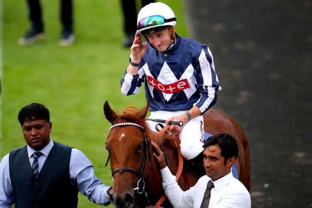 CATCH ME: Jockey Tom Marquand celebrates on Lake Forest after winning the Al Basti Equiworld Dubai Gimcrack Stakes at York Racecourse. Picture: Simon Marper/PA