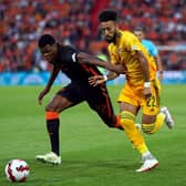 ONE TO WATCH: Netherlands' Denzel Dumfries (latest)  battles with Wales' Sorba Thomas during a UEFA Nations League match in June. PICTURE: Tim Goode/PA
