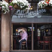 Pub giant JD Wetherspoon has revealed a jump in sales over the past quarter as it saw strong demand for its value-focused drink and food offer. (Photo by Victoria Jones/PA Wire)