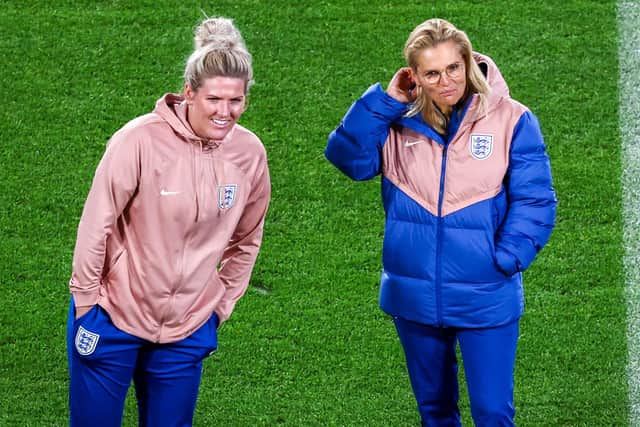 England's team coach Sarina Wiegman (R) and player Millie Bright take part in a stadium familiarisation at Stadium Australia in Sydney on August 15, 2023, ahead of the Women's World Cup football semi-final match between Australia and England. (Picture: DAVID GRAY/AFP via Getty Images)