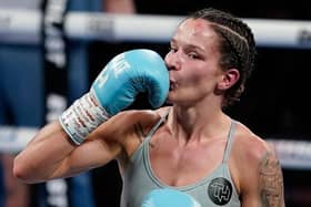 Terri Harper kisses her glove after beating Rhiannon Dixon to win the WBO lightweight world title in Sheffield (Picture: Dave Thompson/Matchroom Boxing)
