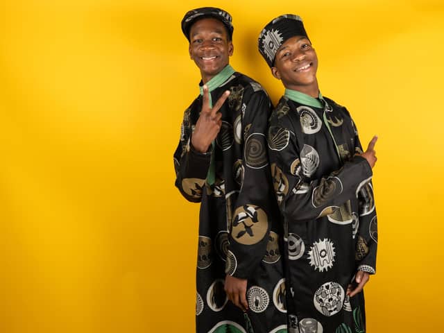 Daniel & David Obinwa for Armley ward wear kurtas by MK Noor, flat cap by Alison Turton and a fila by Ike Choice Couture in fabric by Burberry made in Keighley. Picture by Laurelle Kamara