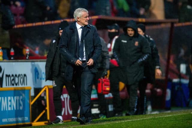 Bradford City boss Mark Hughes leaves the pitch at half time against Northampton Town. Picture: Bruce Rollinson