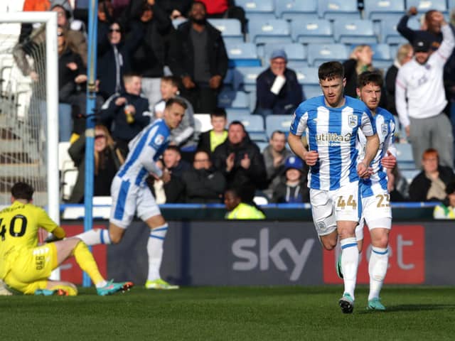 Huddersfield Town's Rhys Healey after scoring their first goal of the game during the Sky Bet Championship match at the John Smith's Stadium, Huddersfield. Picture date: Friday March 29, 2024. PA Photo. See PA story SOCCER Huddersfield. Photo credit should read: Ian Hodgson/PA Wire.

RESTRICTIONS: EDITORIAL USE ONLY No use with unauthorised audio, video, data, fixture lists, club/league logos or "live" services. Online in-match use limited to 120 images, no video emulation. No use in betting, games or single club/league/player publications.