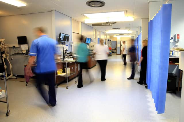 Staff on a NHS hospital ward. PIC: Peter Byrne/PA Wire
