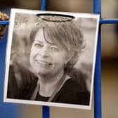 A photograph of Ruth Perry attached to the fence outside John Rankin Schools in Newbury, Berkshire, where headteacher Flora Cooper is planning to refuse entry to Ofsted inspectors following the death of Ms Perry, who was head at nearby Caversham Primary School in Reading. PIC: Andrew Matthews/PA Wire