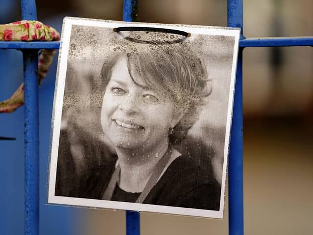 A photograph of Ruth Perry attached to the fence outside John Rankin Schools in Newbury, Berkshire, where headteacher Flora Cooper is planning to refuse entry to Ofsted inspectors following the death of Ms Perry, who was head at nearby Caversham Primary School in Reading. PIC: Andrew Matthews/PA Wire