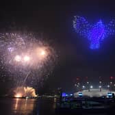 Fireworks and drones illuminate the night sky over London on New Year's Eve in 2020. PIC: Victoria Jones/PA Wire