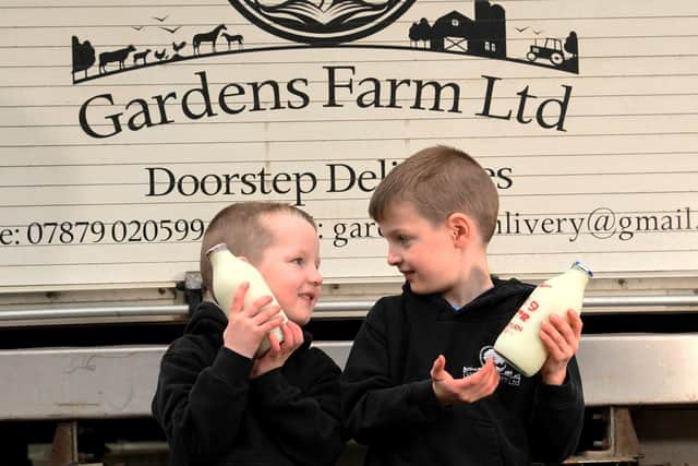 Gardens Farm Greetland, Halifax. George and Eric Ogden pictured with the milk
