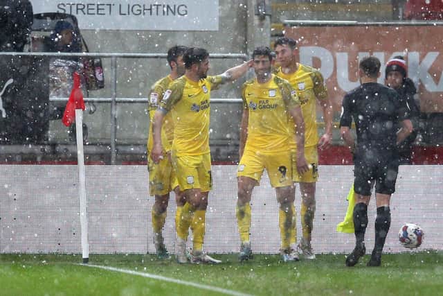 Preston North End's Ched Evans (second right) celebrates scoring their side's second goal as the snow falls in Rotherham (Picture: Nigel French/PA Wire)