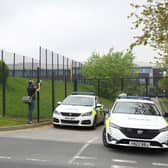 Police outside the Birley Academy in Sheffield, South Yorkshire, where a 17-year-old boy has been arrested on suspicion of attempted murder. A child was assaulted and two adults suffered minor injuries in the incident.  Dominic Lipinski/PA Wire