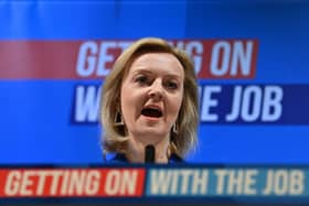 (FILES) In this file photo taken on March 19, 2022 Britain's Foreign Secretary Liz Truss speaks during the Conservative Party Spring Conference at Blackpool Winter Gardens in Blackpool, northwest England. - After a gruelling nationwide tour, a dozen hustings and three televised debates, Liz Truss appears poised to take over as the UK's next prime minister heading into the close of voting by Conservative party members on Friday. (Photo by Paul ELLIS / AFP) (Photo by PAUL ELLIS/AFP via Getty Images)