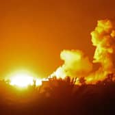 A picture taken in eastern Syrian province of Deir Ezzor shows explosions following shelling. PIC: DELIL SOULEIMAN/AFP/Getty Images