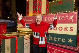 Gyles Brandreth at a festive books event. Picture credit: Alamy/PA.