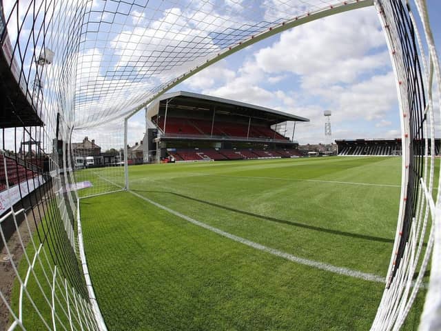 A “much-loved” Grimsby Town academy footballer and his father have died in a “tragic incident”, the Lincolnshire club has announced.