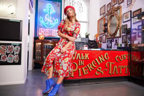 At Red Tattoo Studio at the Corn Exchange, model wears: Poppy floral dress, £60, at Joe Browns.
