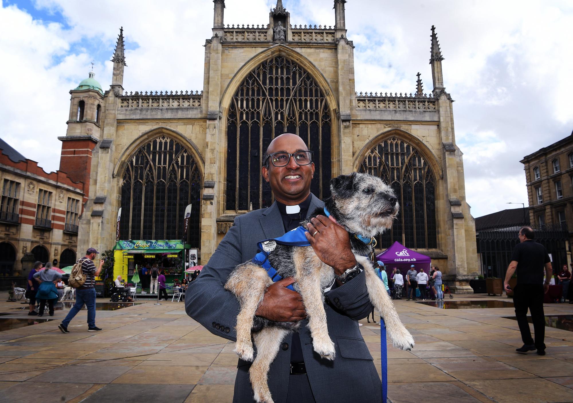 Revd Rob Sueka with border terrier Hugo