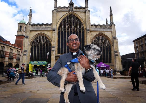 Revd Rob Sueka with border terrier Hugo