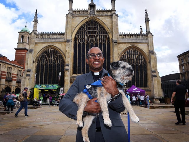 Revd Rob Sueka with border terrier Hugo