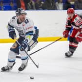 STAYING POSITIVE: Sheffield Steeldogs' defence Tim Smith (above left) in action during the 3-0 defeat at home to Swindon Wildcats last weekend. Picture courtesy of Peter Best/Steeldogs Media