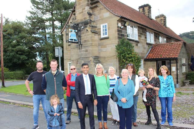 Rishi Sunak MP for Richmond with villagers, business owners and parish council representatives outside the Blue Bell Inn, Ingleby Cross.