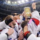 PARTY TIME: GB's players celebrate coming first in Division 1A of the IIHF World Championships in Nottingham in May - earning promotion back to the top tier of the world game at the first attempt Picture: Dean Woolley/Ice Hockey UK