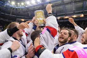 PARTY TIME: GB's players celebrate coming first in Division 1A of the IIHF World Championships in Nottingham in May - earning promotion back to the top tier of the world game at the first attempt Picture: Dean Woolley/Ice Hockey UK