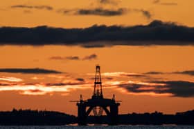 The sun rising behind a redundant oil platform moored in the Firth of Forth near Kirkcaldy, Fife. PIC: Jane Barlow/PA Wire