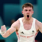 Harry Hepworth of Team Great Britain celebrates after his routine on the rings during the Artistic Gymnastics Men's Team Final in Paris (Picture: Naomi Baker/Getty Images)