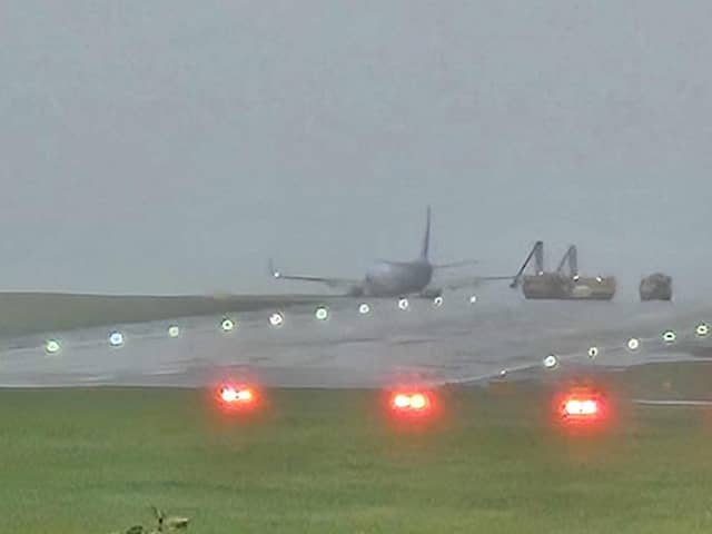 The plane skidded off of the runway while landing on Friday afternoon