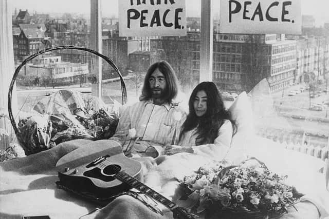John Lennon and Yoko Ono in their bed in the Presidential Suite of the Hilton Hotel, Amsterdam in 1969 (Photo: Keystone/Hulton Archive/Getty Images)