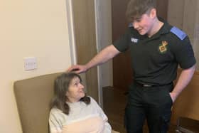 Student paramedic Matthew Up-Richard with Aden Mount Care Home resident Jane Louise Flower.