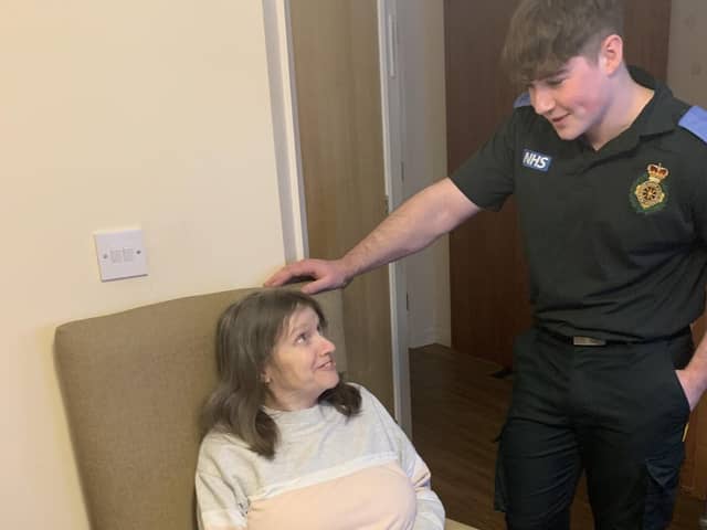 Student paramedic Matthew Up-Richard with Aden Mount Care Home resident Jane Louise Flower.