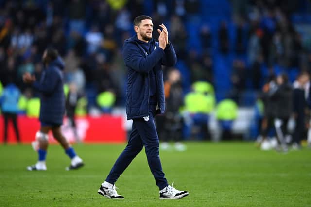 CARDIFF, WALES - JANUARY 08: Mark Hudson, Manager of Cardiff City, applauds the fans following the Emirates FA Cup Third Round match between Cardiff City and Leeds United at Cardiff City Stadium on January 08, 2023 in Cardiff, Wales. (Photo by Dan Mullan/Getty Images)
