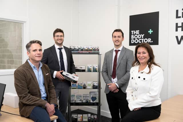 Ward Hadaway’s Bill Goodwin with , left to right, The Body Doctor’s sales and marketing director Sam Wymer, Adam Wymer, the company’s operations director, and managing director Sue Grant.’