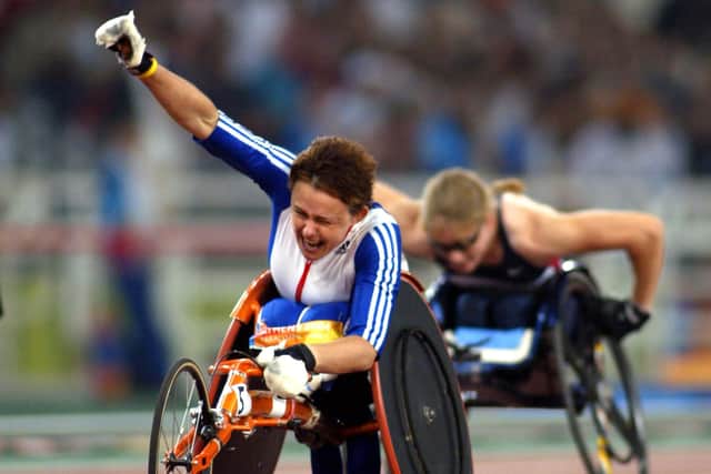 INSPIRATIONAL: Tanni Grey Thompson celebrates winning in 2004, she became Britain's most famous Paralympian who claimed 11 gold medals. Picture: Gareth Copley/PA Wire.