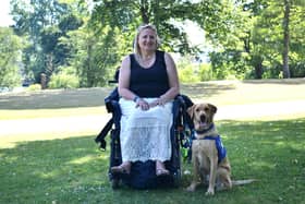 Wendy Martin with now-retired support dog Kevin