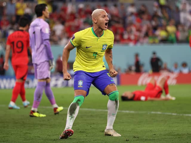Richarlison celebrates after Lucas Paqueta of Brazil (not pictured) scored their sides fourth goal against South Korea. (Picture: Michael Steele/Getty Images)