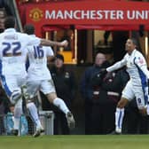 MANCHESTER, ENGLAND - JANUARY 03:  Jermaine Beckford (R) of Leeds United celebrates scoring the opening goal during the FA Cup sponsored by E.ON 3rd Round match between Manchester United and Leeds United at Old Trafford on January 3, 2010 in Manchester, England. (Photo by Alex Livesey/Getty Images)